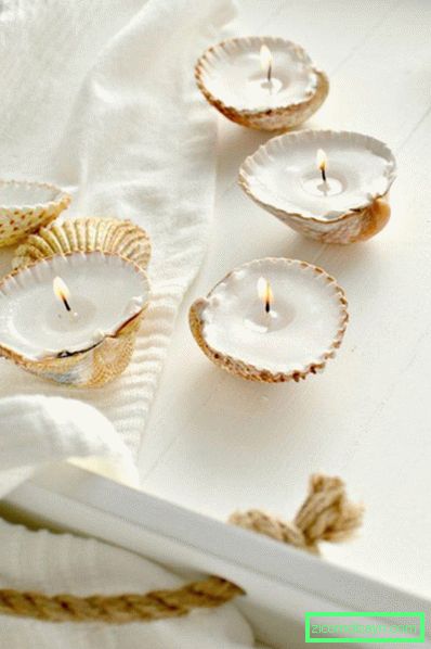 Mini candele fatte di conchiglie