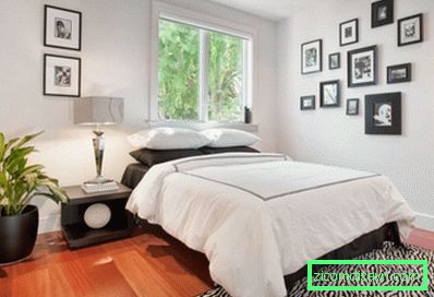 semplice-window-tra-picture-and-matrimoniale-on-legno-terra-in-black-and-white-camera da letto